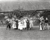 Party blowing trumpets at Sedgeford Hall Original caption: Party blowing trumpets