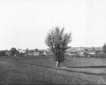 Sedgeford church and washpits from the park View from the Boneyard field to NW over Reeddam to Sedgeford church, West Hall farm and Washpit cottages Original caption: Church and washpits from the park