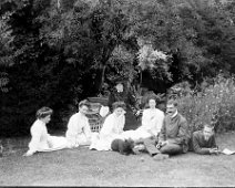 Group of young adults on lawn Original caption: Group of young adults on lawn