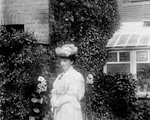 Lady in best dress and hat Original caption: Lady in best dress and hat