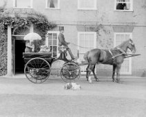 Mother. Miss B. & 3 boys in carriage Sedgeford Hall Original caption: Mother. Miss B. and 3 boys in carriage