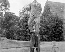 Reggie on ladder, Gilbert holding, Sedgeford Hall Original caption: Reggie on ladder, Gilbert holding