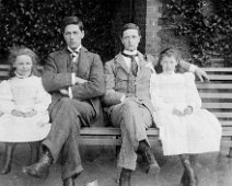 Gilbert, Reggie, Nona, & Helen (smiling) Original caption: Gilbert, Reggie, Nona, and Helen (smiling)