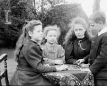 Group of children playing Ludo Original caption: Group of children playing Ludo