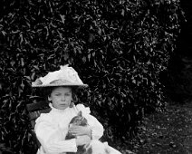 Helen with cat on lap Original caption: Helen with cat on lap