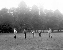 Family playing golf Sedgeford Hall park Original caption: Family playing golf