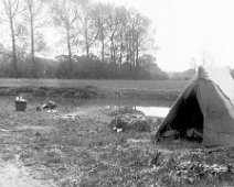 Charcoal burners tent and fire Original caption: Charcoal burners tent and fire