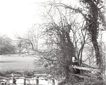 Frank near stream Sedgeford Park Original caption: Frank near stream