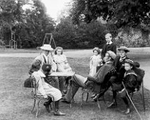 Family group on lawn Sedgeford Hall Original caption: Family group on lawn