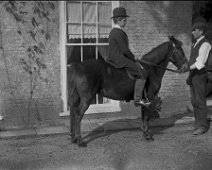 William with boy on pony Original caption: William with boy on pony