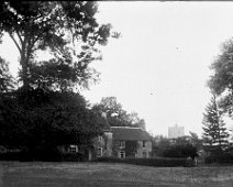 Large house and Heacham church Original caption: Large house and Heacham church