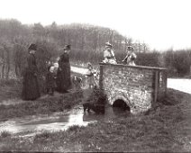 Family group by bridge Bridge at Fring Cross/Peddars Way crossing Original caption: Family group by bridge