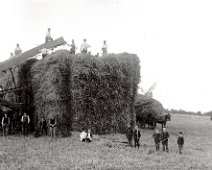 Making a rick In the field due west of Sedgeford Mill Original caption: Making a rick