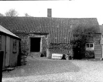 Village house and yard Original caption: Village house and yard