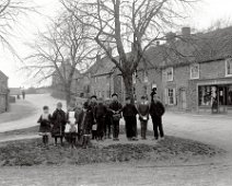 Youths on Sedgeford village green Cole Green looking west Original caption: Youths on Sedgeford village green