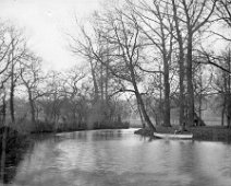 Man in boat on river Original caption: Man in boat on river