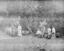 Family group in a garden Original caption: Family group in a garden