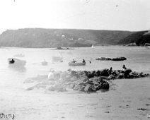 Scene of fishing boats and swimmers View to South Sands Beach probably from the southern end of Sunny Cove beach – Same promontory outline at top left of frame as seen in S5:14 Original caption:...