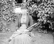 A lady with a croquet mallet Original caption: A lady with a broom