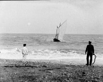 Fishing boat approaching shore Original caption: Fishing boat approaching shore