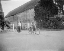 2 girls with bicycles, Sedgeford Hall Original caption: 2 girls with bicycles