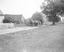 Hay cart in lane Original caption: Hay cart in lane