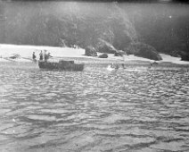 South end of Sunny Cove Salcombe Harbour Original caption: View of beach party from a boat