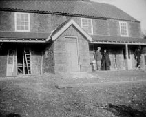 Father inspecting new house Father and Rev Ogle and wife outside Brookdale, Church Lane, Sedgeford Original caption: Father inspecting new house