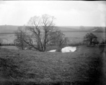 View south over The Ladywell, opposite Hill Farm from west end of Church Lane Sedgeford Original caption: Landscape with river