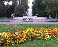20150804_185904 Relaxing at the fountain next to the Restaurant Perle du Lac