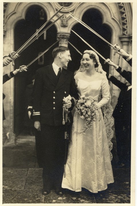 16.TheBrideAndBridegroomLeavingTheChurchThroSwordArch