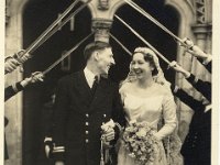 16.TheBrideAndBridegroomLeavingTheChurchThroSwordArch.jpg